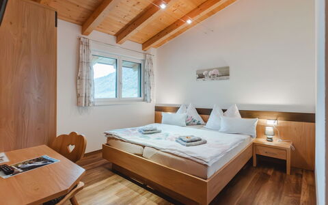 Ingrid: Table, Furniture, Property, Building, Window, Comfort, Wood, Bed Frame, Interior Design, Lamp