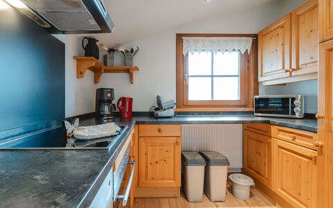 Angererhof: Kitchen, Kitchen Appliance, Countertop, Cabinetry, Wood, Flooring, Interior Design, Furniture, Major Appliance, Floor