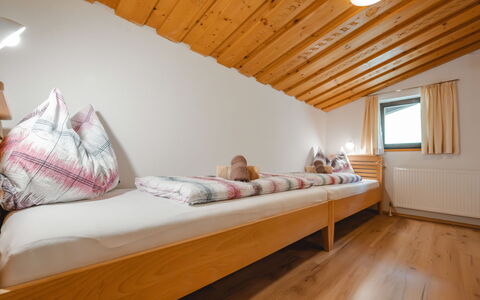Angererhof: Home, House, Ceiling, Bed, Hardwood, Bedroom, Bed Frame, Wood Stain, Wood Flooring, Dormitory