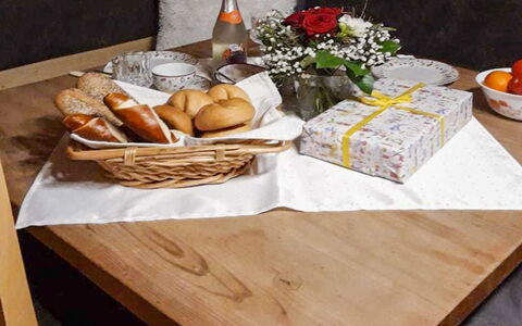 Sturmbachhütte: Table, Furniture, Room, Countertop, Dining Room, Wood, Interior Design, Brunch, Hardwood, Coffee Table