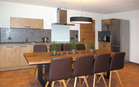 Apart Bergart: Table, Furniture, Cabinetry, Chair, Building, Countertop, Wood, Kitchen, Interior Design, Flooring