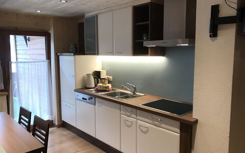 Prutz Kaunertal 656: Cabinetry, Furniture, Countertop, Kitchen Stove, Kitchen Appliance, Sink, Home Appliance, Wood, Chair, Kitchen
