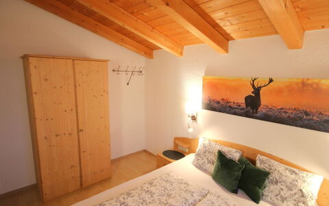 Spiss-Samnaun 602: Wood, Ceiling, Interior Design, Room, Wood Stain, Bedroom, Bed Sheet, Linens, Light Fixture, Bed Frame