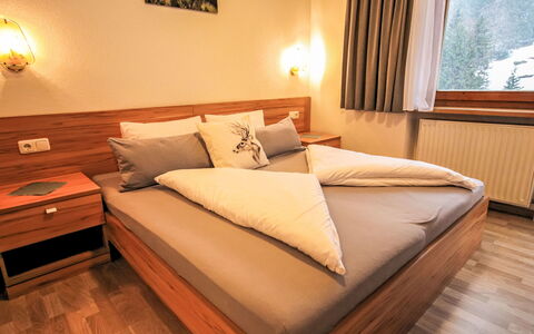 The Siegele: Wood, Furniture, Flooring, Interior Design, Bed, Floor, Bedroom, Wood Flooring, Wood Stain, Bed Frame
