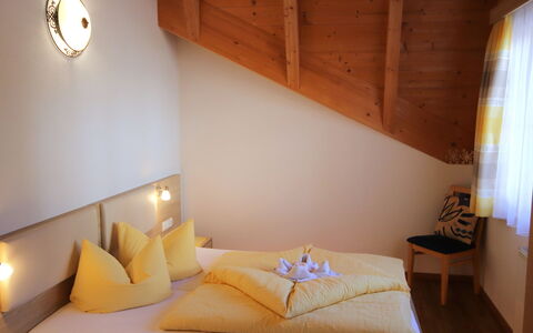 Bergblick: Interior Design, Ceiling, Linens, Bedroom, Wood Stain, Hotel, Bed Frame, Bed, Chair, Bedding