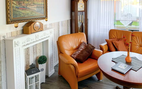 Christine: Furniture, Couch, Table, Picture Frame, Plant, Wood, Comfort, Living Room, Orange, Interior Design