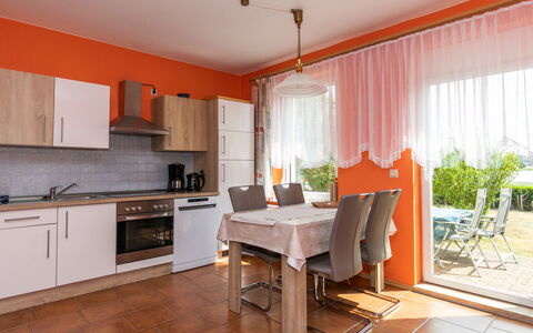 Waase 606: Furniture, Property, Cabinetry, Plant, Table, Countertop, Chair, Window, Wood, Interior Design