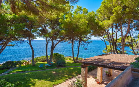 Finca L'Embat: Water, Plant, Sky, Property, Building, Shade, Natural Landscape, House, Tree, Outdoor Furniture