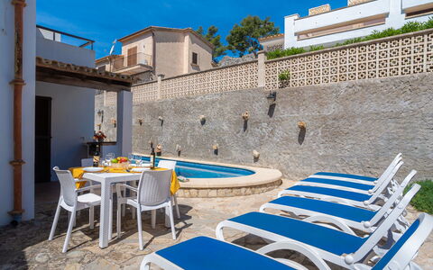 Cala San Vicente 625: Furniture, Property, Building, Blue, Sky, Azure, Outdoor Furniture, Shade, Architecture, Table