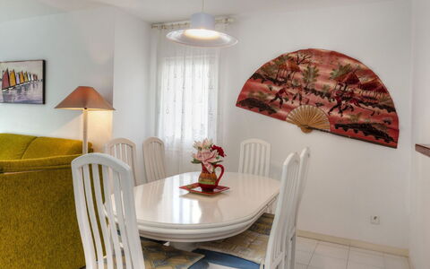 Golf Royal Delta: Room, Property, Interior Design, Furniture, Table, Yellow, Dining Room, Wall, Floor, House