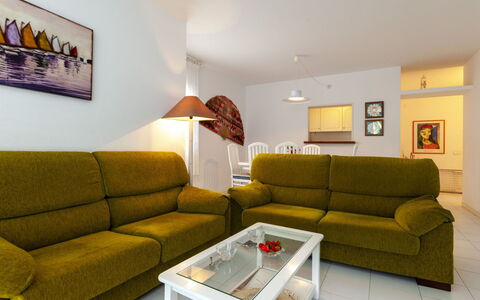 Golf Royal Delta: Living Room, Furniture, Room, Couch, Property, Interior Design, Sofa Bed, Yellow, Table, Floor