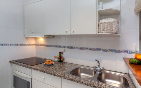 Trebol Blanco: Countertop, Property, Cabinetry, Kitchen, Room, Furniture, Tile, Interior Design, Sink, Kitchen Stove