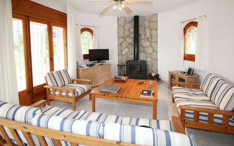 Casa del Bosc: Picture Frame, Furniture, Property, Window, Ceiling Fan, Comfort, Table, Couch, Wood, Window Blind