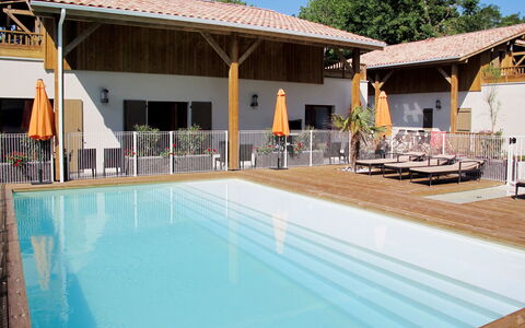 Lacanau 655: Water, Sky, Swimming Pool, Building, Shade, Chair, Tree, Plant, Outdoor Furniture, Leisure