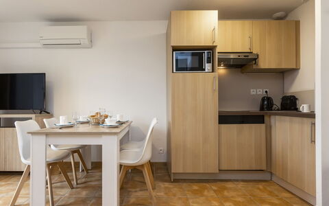 Sarlat-La-Canéda 607: Furniture, Cabinetry, Table, Wood, Countertop, Kitchen, Interior Design, Building, Flooring, Floor