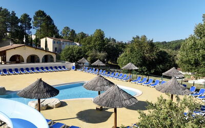 Vallon-Pont-D'Arc 621: Sky, Umbrella, Tree, Blue, Shade, Plant, Building, Swimming Pool, Outdoor Furniture, Leisure