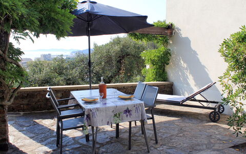 Le Lavandou 604: Property, Furniture, Patio, Table, House, Backyard, Yard, Outdoor Table, Building, Real Estate