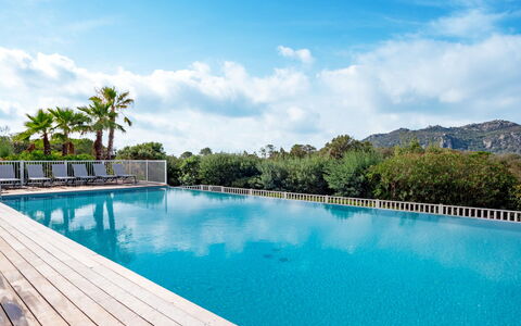 Porto Vecchio 658: Water, Cloud, Sky, Property, Swimming Pool, Azure, Tree, Plant, Outdoor Furniture, Natural Landscape
