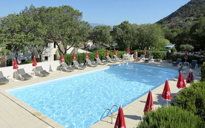 Porto Vecchio 661: Swimming Pool, Resort, Property, Leisure, Town, Resort Town, Vacation, Tree, Tourism, Real Estate