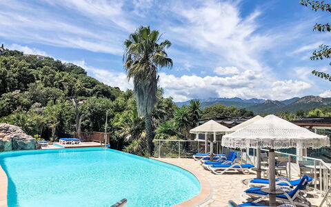 Pinarellu 603: Blue, Swimming Pool, Resort, Outdoor Furniture, Eco Hotel, Hotel, Sunlounger, Umbrella, Resort Town