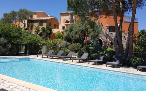 Calvi 610: Water, Plant, Property, Sky, Building, Azure, Swimming Pool, Tree, Shade, Architecture