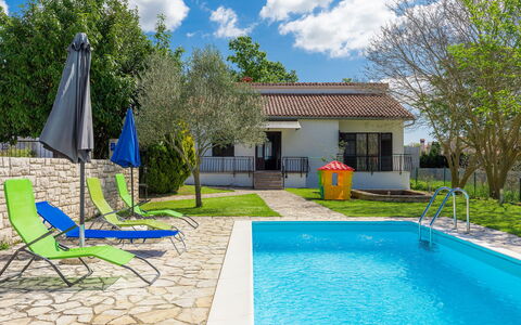 Dora: Sky, Water, Cloud, Plant, Building, Property, Green, Blue, Azure, Swimming Pool