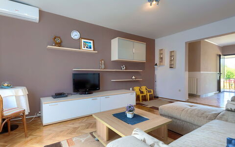 Dora: Table, Furniture, Couch, Property, Television, Wood, Home Appliance, Interior Design, Studio Couch, Living Room