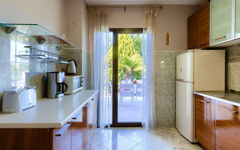 Dora: Cabinetry, Countertop, Property, Furniture, Building, Kitchen Appliance, Kitchen, Home Appliance, Wood, Lighting