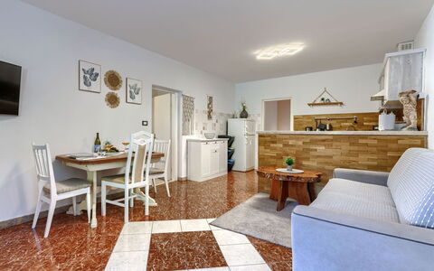Viliam: Furniture, Interior Design, Flooring, Floor, Wood, Ceiling, Couch, Room, Lighting, Living Room