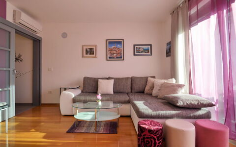 Pinezic: Couch, Furniture, Property, Comfort, Wood, Purple, Interior Design, Studio Couch, Flooring, Living Room