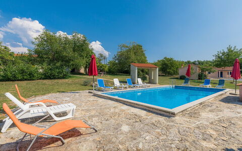 Danijela: Sky, Water, Building, Swimming Pool, Shade, Outdoor Furniture, Cloud, Rectangle, Tree, Chair