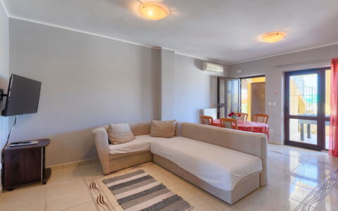 Gracije: Couch, Property, Furniture, Table, Picture Frame, Comfort, Interior Design, Lighting, Living Room, Flooring