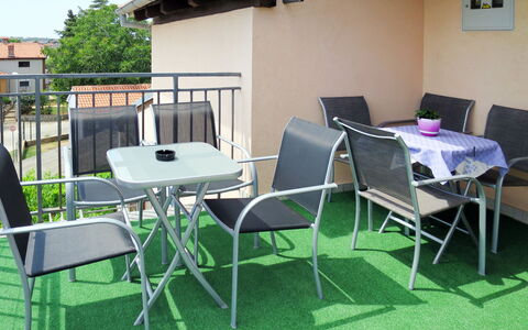 Pula 671: Table, Property, Furniture, Grass, Chair, Room, Artificial Turf, Folding Chair, Restaurant, House