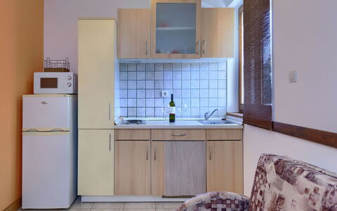 Gabi: Cabinetry, Furniture, Countertop, Sink, Kitchen Sink, Building, Tap, Kitchen, Wood, Purple