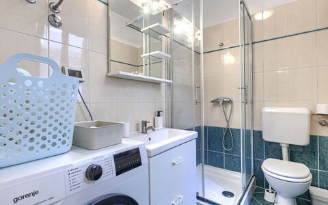 Ester: Washing Machine, Plumbing Fixture, Interior Design, Flooring, Bathroom, Floor, Sink, Bathroom Cabinet, Laundry Room, Bathroom Sink