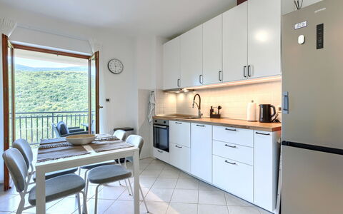 Ester: Furniture, Kitchen, Kitchen Appliance, Interior Design, Major Appliance, Countertop, Flooring, Wood, Cabinetry, Ceiling