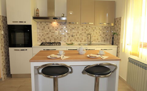 La Donja: Sink, Countertop, Plumbing Fixture, Tap, Cabinetry, Wood, Building, Bathroom Cabinet, Kitchen, Flooring