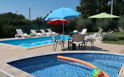 Kos: Water, Property, Umbrella, Swimming Pool, Sky, Azure, Plant, Tree, Shade, Outdoor Furniture
