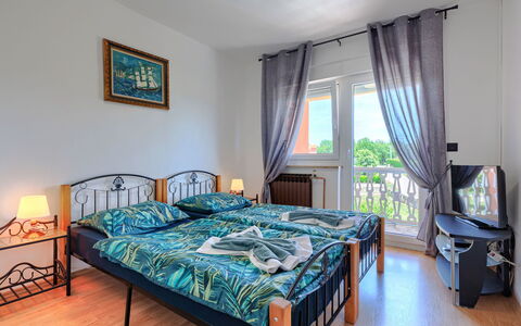 Lola: Furniture, Apartment, Hardwood, Bedding, Wood Stain, Bed, Linens, Bedroom, Hotel, Balcony