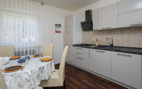 Lola: Room, Property, Furniture, Kitchen, Interior Design, Building, Floor, Countertop, House, Yellow