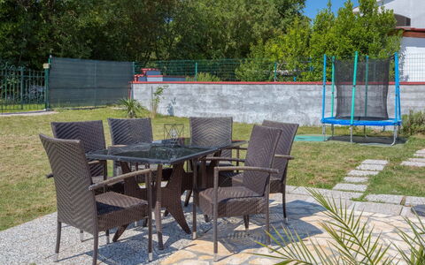 Lola: Furniture, Property, Yard, Patio, Table, Landscaping, House, Backyard, Room, Real Estate