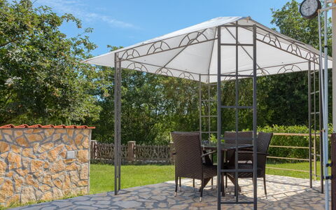 Lola: Plant, Sky, Shade, Tree, Tent, Building, Road Surface, Chair, Grass, Outdoor Furniture
