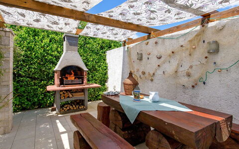 Villa Gabriel: Building, Plant, Table, Wood, Flowerpot, Interior Design, House, Outdoor Furniture, Tree, Roof