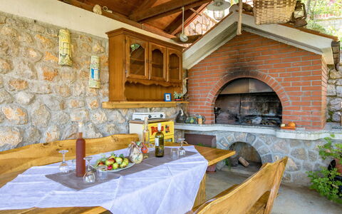 Mošćenička Draga 616: Property, Furniture, Table, Wood, Interior Design, Living Room, Plant, Beam, Countertop, Wall