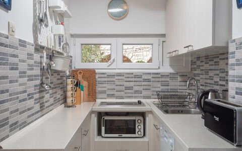Fister: Countertop, Property, Room, White, Kitchen, Cabinetry, Interior Design, Building, Furniture, House