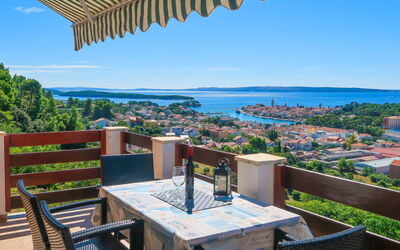 Rab Rab 676: Sky, Table, Furniture, Property, Daytime, Building, Water, Chair, Azure, Nature