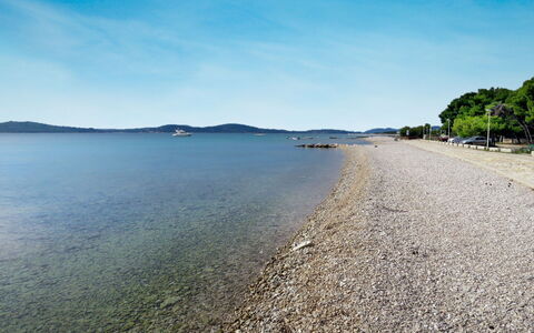 Antonio: Sky, Water, Cloud, Water Resources, Azure, Coastal And Oceanic Landforms, Tree, Natural Landscape, Beach, Bank