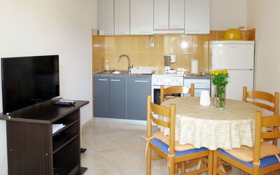 Camp Marko 637.3: Furniture, Room, Property, Kitchen, Cabinetry, Countertop, Building, Interior Design, Floor, Table