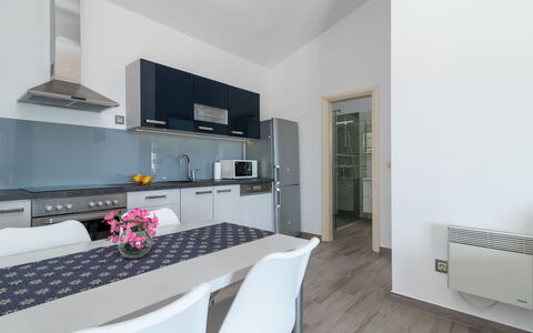 Ria with Heated Pool: Cabinetry, Furniture, Countertop, Building, Interior Design, Wood, Floor, Flooring, Living Room