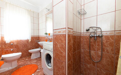 Trogir 631: Brown, Plumbing Fixture, Property, Bathroom, Mirror, Shower Door, Tap, Toilet, Wood, Orange